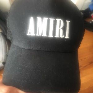 This trucker hat features the brand logo
Snap closure Cotton/lyocell/polyester